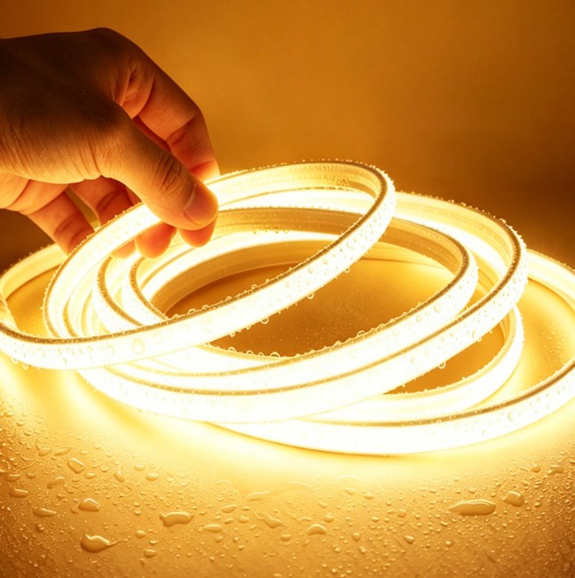 Tira LED COB 220V Directa 10W/m IP65 C/Autoadhesiva - Corte cada 10cm - 2100K Dorado